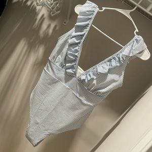 Size 14 blue and white striped one piece swimsuit.
